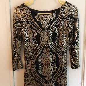 Black and gold sequin dress